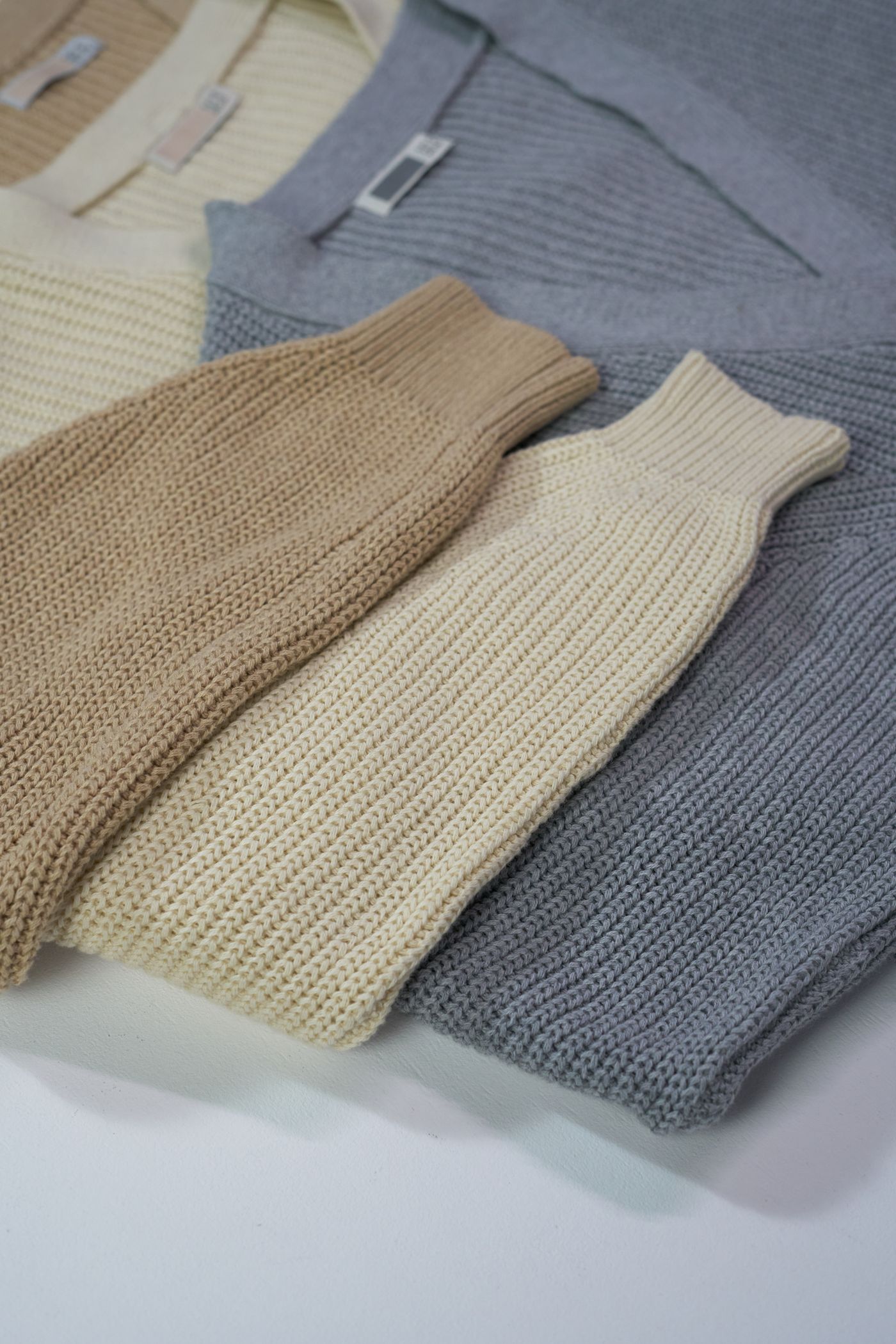 Monoloom Rib Crew, folded ribbed knits in cream and grey